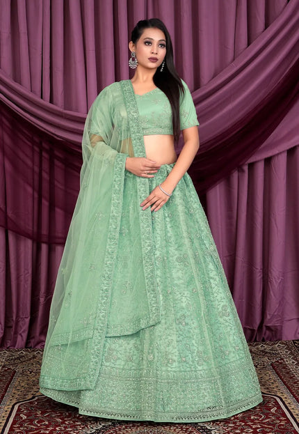 Pista Party Wear Embroidered Net Lehenga Choli For Women