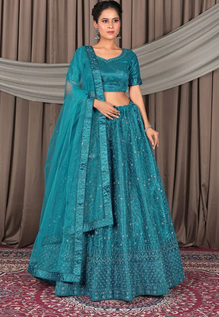 Firozi Designer Net Lehenga Choli For Weddings - Gajiwala